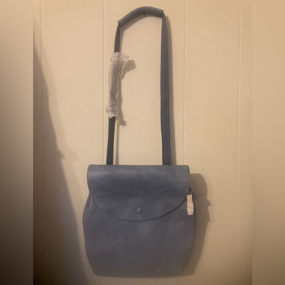Calin collection denim colored Vegan Leather Convertible backpack.
